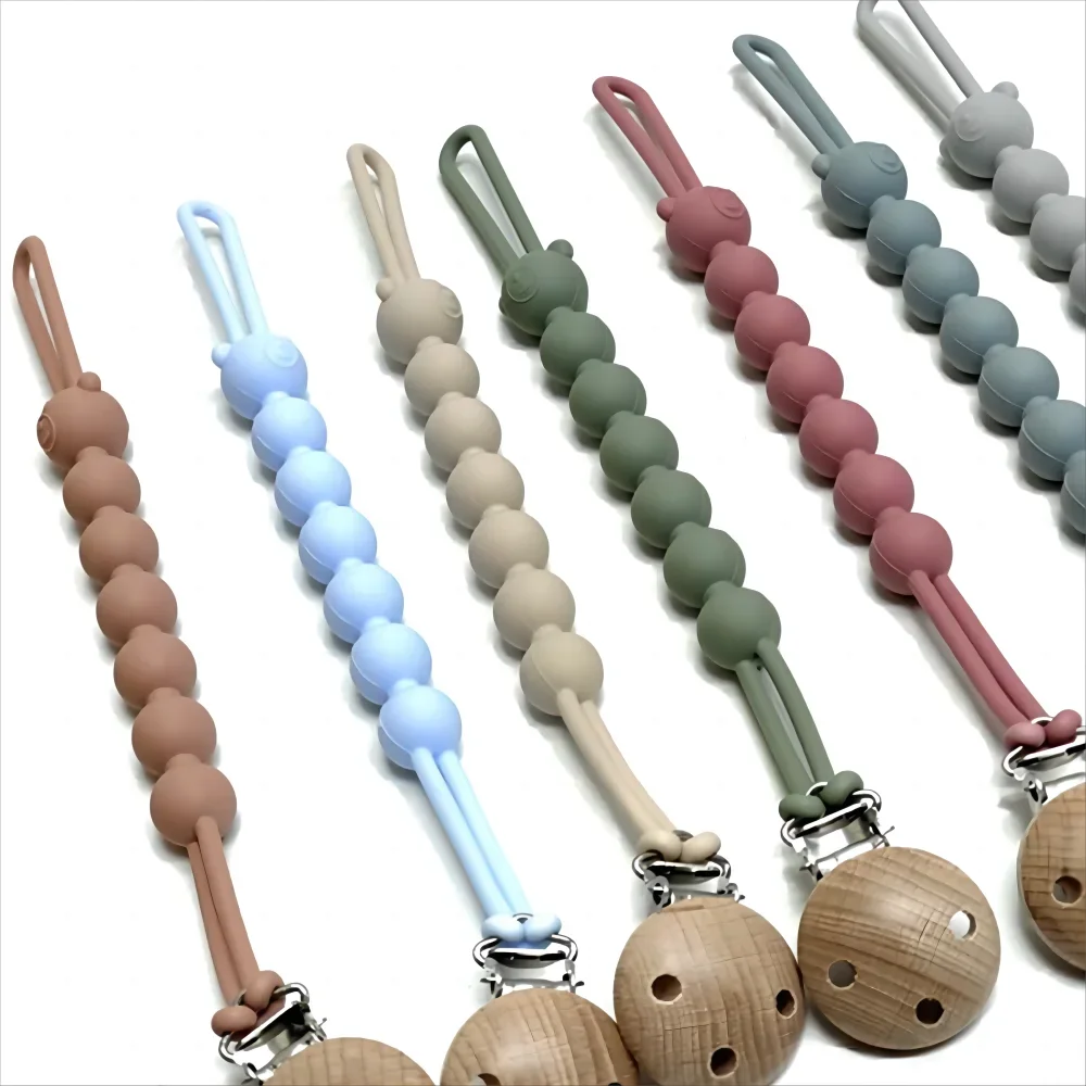 Attache-tétine en silicone
