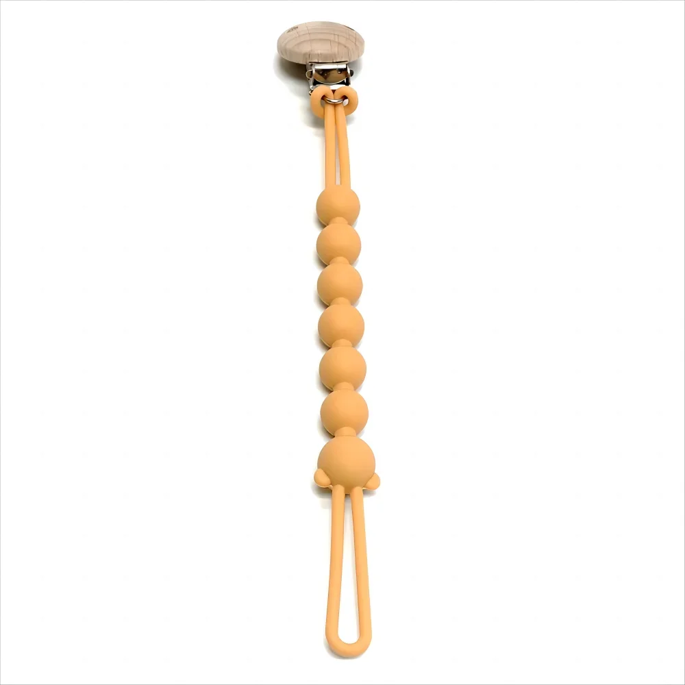 Attache-tétine en silicone