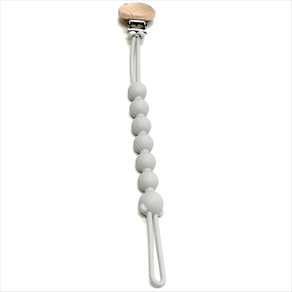 Attache-tétine en silicone