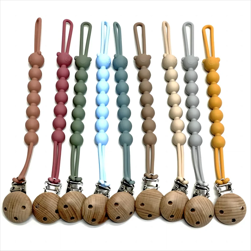 Attache-tétine en silicone