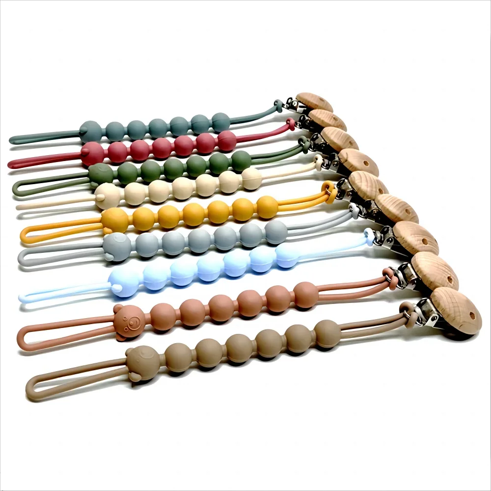 Attache-tétine en silicone