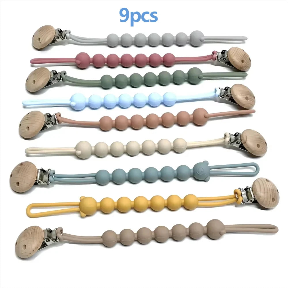 Attache-tétine en silicone