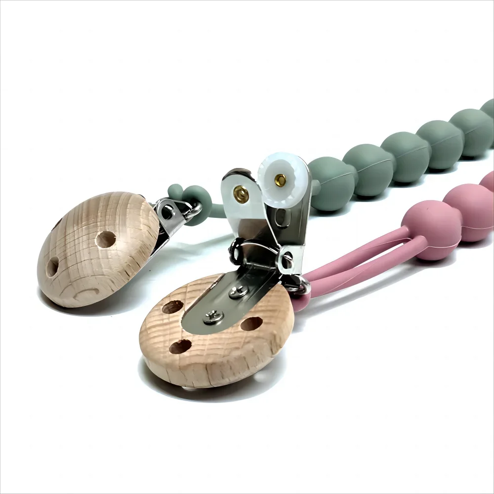 Attache-tétine en silicone